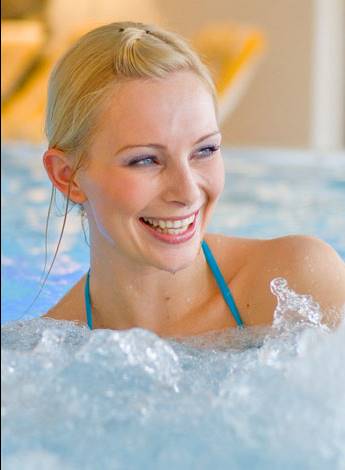 Blonde woman in a whirlpool in detail